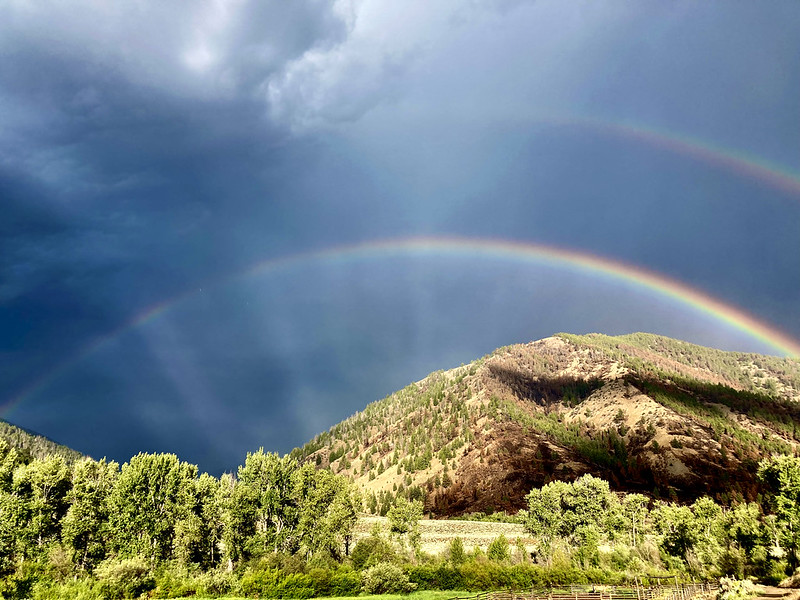 Precipitation over the 2022 Woodtick Fire creates a double rainbow